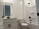 Bathroom featuring a vanity, toilet and shower with modern fixtures at 18271 W La Senda Dr, Surprise, AZ 85387
