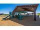 Community playground with slides, climbing structures and shaded from the hot days in this Gathering-friendly area at 18271 W La Senda Dr, Surprise, AZ 85387