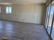 Bright living area with tile flooring and large windows providing natural light at 18272 W Camino De Oro --, Surprise, AZ 85387