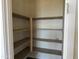 Pantry featuring adjustable shelving with ample storage space at 18272 W Camino De Oro --, Surprise, AZ 85387
