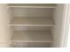 Spacious walk-in closet with multiple shelves provides space for organization and storage at 18717 N 267Th Dr, Buckeye, AZ 85396