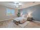 Serene bedroom with a calming color scheme, comfortable furnishings, and great natural light at 20641 W College Dr, Buckeye, AZ 85396