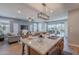 Kitchen island view with modern appliances with direct open access to the living and back yard at 20641 W College Dr, Buckeye, AZ 85396