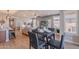 Charming dining area blends seamlessly with the living room, featuring natural light and modern décor at 20641 W College Dr, Buckeye, AZ 85396