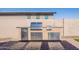 Outdoor kitchen with stainless steel appliances, sink, and ample counter space for entertaining at 20641 W College Dr, Buckeye, AZ 85396