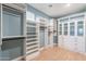 Spacious walk-in closet with custom shelving and cabinets for ample storage at 20641 W College Dr, Buckeye, AZ 85396