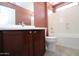 Bathroom featuring tub, shower, and wood vanity with mirror at 2213 W Marconi Ave, Phoenix, AZ 85023