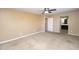 Large main bedroom includes a ceiling fan and bathroom access at 2213 W Marconi Ave, Phoenix, AZ 85023