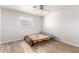 Cozy bedroom boasts tile floors, white walls, and ceiling fan at 2221 N Richland St, Phoenix, AZ 85006