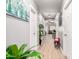 Hallway leading to other rooms, featuring neutral walls and luxury vinyl plank flooring at 2221 N Richland St, Phoenix, AZ 85006