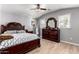 Main bedroom showcasing wooden furniture and luxury vinyl plank flooring at 2221 N Richland St, Phoenix, AZ 85006
