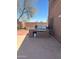 Backyard features an outdoor kitchen with built-in grill, perfect for entertaining guests at 23890 W Twilight Trl, Buckeye, AZ 85326
