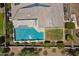 Aerial view of a house, pool, with solar panels and desert landscaping at 26943 N 74Th Ave, Peoria, AZ 85383