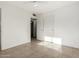 Bedroom featuring tile floors and a closet at 3208 W Port Royale Ln, Phoenix, AZ 85053