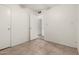 Bedroom featuring tile floors and a closet at 3208 W Port Royale Ln, Phoenix, AZ 85053