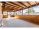Covered patio with concrete floors, ceiling fan, and views of the backyard at 3208 W Port Royale Ln, Phoenix, AZ 85053