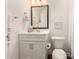 Bathroom features a vanity, mirror, and toilet at 35990 N Desert Tea Dr, Queen Creek, AZ 85140