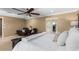 This bedroom has neutral walls, plush carpeting and a ceiling fan at 3760 W Lapenna Dr, New River, AZ 85087