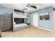 Bedroom featuring a grey bunk bed, ceiling fan and closet at 3760 W Lapenna Dr, New River, AZ 85087