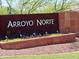 Arroyo Norte community sign with manicured landscaping, inviting residents and visitors to the neighborhood at 3760 W Lapenna Dr, New River, AZ 85087
