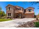Charming two-story home featuring stone accents, a covered porch and a two car garage at 3760 W Lapenna Dr, New River, AZ 85087