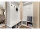 Mudroom with hooks, storage, and bench seating at 3760 W Lapenna Dr, New River, AZ 85087