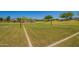 Community volleyball court nestled in lush greenery, offering a perfect spot for outdoor games and recreation at 3760 W Lapenna Dr, New River, AZ 85087