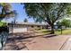Ranch style home with front yard and driveway at 4117 E Coolidge St, Phoenix, AZ 85018