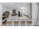 Elegant kitchen featuring a marble island, modern appliances, and white cabinetry at 4117 E Coolidge St, Phoenix, AZ 85018