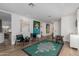 Spacious living room with stylish furniture, modern decor, and hardwood floors at 4117 E Coolidge St, Phoenix, AZ 85018