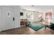 Bright living room features wood floors, modern decor, and ample natural light at 4117 E Coolidge St, Phoenix, AZ 85018