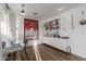 Bright office space with modern desk, decor shelves, storage, and a stylish accent poster at 4117 E Coolidge St, Phoenix, AZ 85018