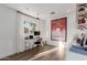 Inviting office space with a modern desk, decor shelves, bright decor and natural light at 4117 E Coolidge St, Phoenix, AZ 85018