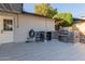 Outdoor patio area featuring outdoor kitchen, grill, and seating area at 4117 E Coolidge St, Phoenix, AZ 85018