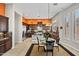Open-concept kitchen and breakfast nook with island, stainless appliances, and ample counter space at 41809 N La Crosse Trl, Anthem, AZ 85086