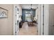 Dedicated home office with large window, neutral walls, and ceiling fan at 41809 N La Crosse Trl, Anthem, AZ 85086