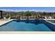 Sparkling pool featuring desert landscaping, tiled trim and mountain views at 41809 N La Crosse Trl, Anthem, AZ 85086