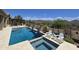 Wonderful backyard pool and spa featuring beautiful desert landscaping and scenic mountain views at 41809 N La Crosse Trl, Anthem, AZ 85086