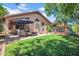 Private backyard featuring outdoor seating area and fun play area for with lush green grass at 4350 E Gatewood Dr, Phoenix, AZ 85050