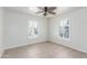 Bedroom with two windows and ceiling fan at 445 W 1St St, Mesa, AZ 85202