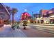 Downtown street with palm trees, benches, and bicycle parking along the side walk at 445 W 1St St, Mesa, AZ 85202