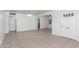 Spacious living room with tile flooring and neutral walls, offering a versatile space at 445 W 1St St, Mesa, AZ 85202