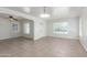 Bright and airy living room with tile floors, neutral paint, and ample natural light at 445 W 1St St, Mesa, AZ 85202