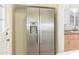 Side-by-side stainless steel refrigerator with water and ice dispenser at 445 W 1St St, Mesa, AZ 85202