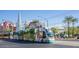 Modern streetcar on a sunny day, showcasing public transit at 445 W 1St St, Mesa, AZ 85202