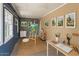 Bright studio space featuring lots of natural light, paint supplies and several paintings at 445 W 1St St, Mesa, AZ 85202