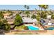 Aerial view showing backyard pool and home's roof at 5127 E Tamblo Dr, Phoenix, AZ 85044