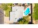 Aerial view showing backyard pool and home's roof at 5127 E Tamblo Dr, Phoenix, AZ 85044