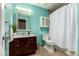 This bathroom features vanity sink, toilet, and shower at 5127 E Tamblo Dr, Phoenix, AZ 85044