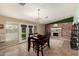 Stylish dining area with views of the bonus room and the backyard at 5127 E Tamblo Dr, Phoenix, AZ 85044